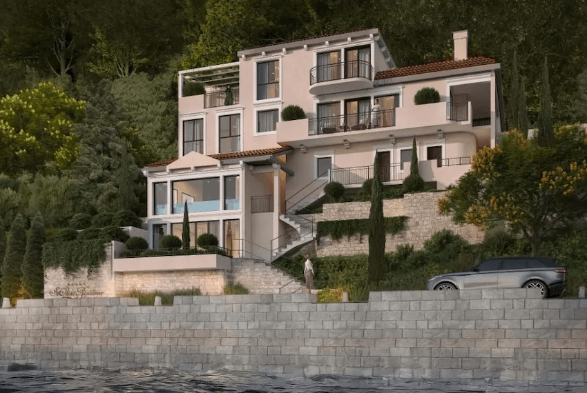 A contemporary villa under construction on the seafront, Stoliv, Kotor Bay