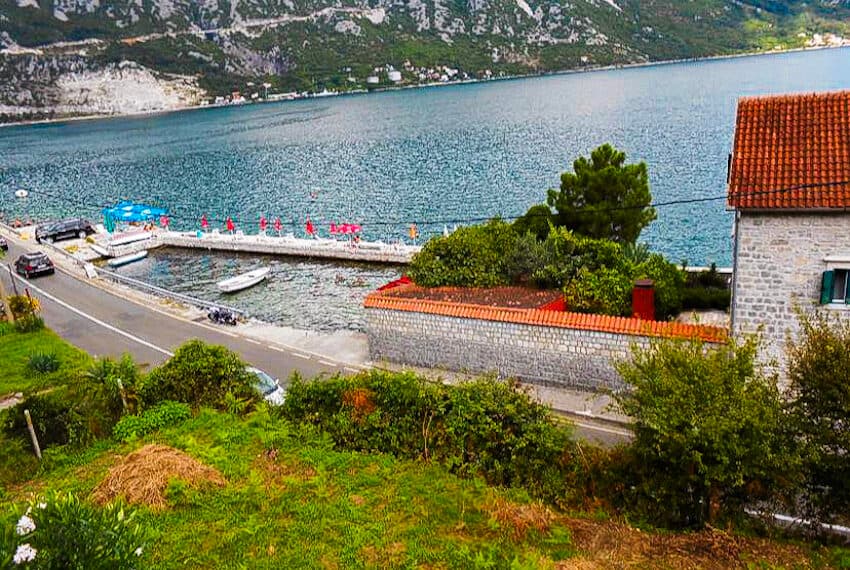 House with a construction plot, steps from the sea, Kostanjica, Kotor Bay