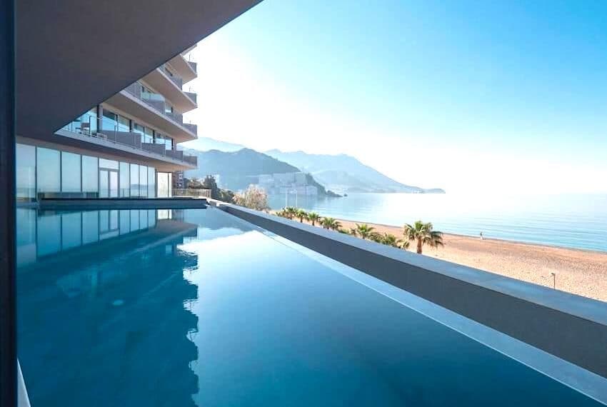 Luxury apartments in a condo hotel on the seafront, Becici
