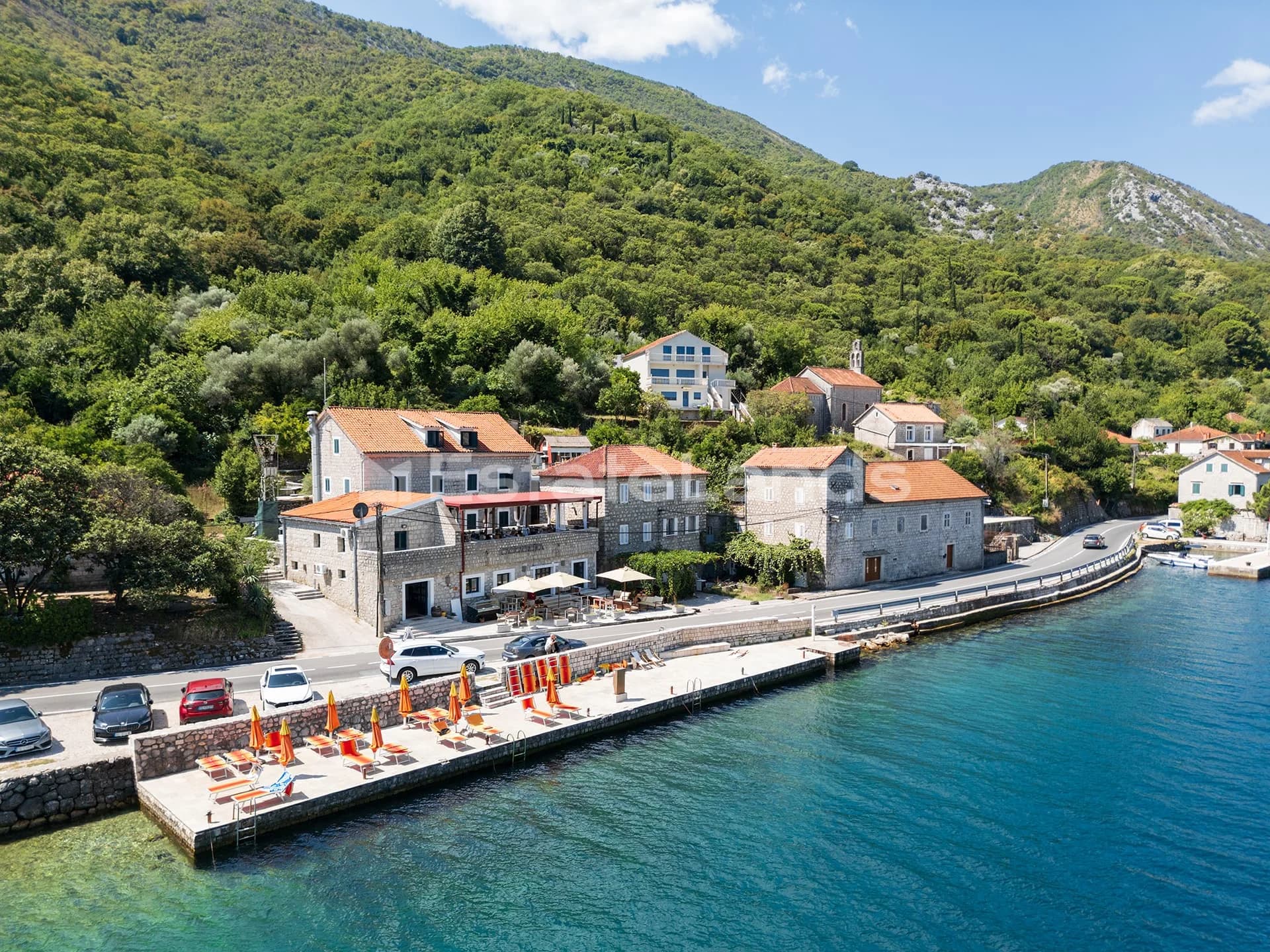 For Sale: Rare Waterfront Stone House Investment Opportunity with Private Courtyard in Kostanjica, Kotor